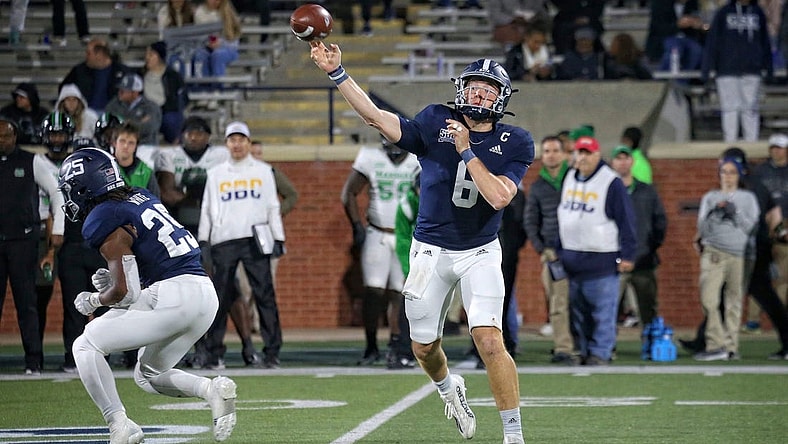 Georgia Southern quarterback Kyle Vantrease (6) passes while running back Jalen Whitehurst says in to block against Marshall.

Gasovsmarshallffortunesmn202230