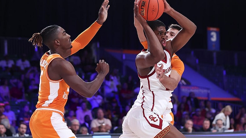Nov 24, 2022; Paradise Island, BAHAMAS; USC Trojans forward Joshua Morgan (24) passes the ball as Tennessee Volunteers guard Jahmai Mashack (15) and Tennessee Volunteers guard Santiago Vescovi (25) defend during the first half at Imperial Arena. Mandatory Credit: Kevin Jairaj-USA TODAY Sports