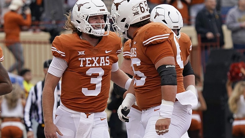 Nov 25, 2022; Austin, Texas, USA; Texas Longhorns quarterback Quinn Ewers (3) reacts after running in to the end zone for touchdown during the first half against the Baylor Bears at Darrell K Royal-Texas Memorial Stadium. Mandatory Credit: Scott Wachter-USA TODAY Sports