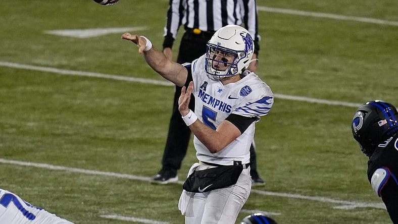 Nov 26, 2022; Dallas, Texas, USA;  Memphis Tigers quarterback Seth Henigan (5) passes the ball against the Southern Methodist Mustangs during the second half at Gerald J. Ford Stadium. Mandatory Credit: Chris Jones-USA TODAY Sports
