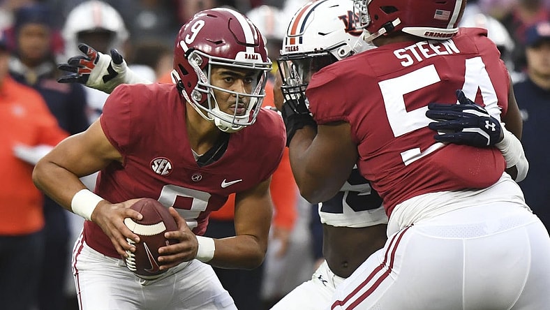 Nov 26, 2022; Tuscaloosa, Alabama, USA; Alabama Crimson Tide quarterback Bryce Young (9) drops back to pass as offensive lineman Tyler Steen (54) blocls against the Auburn Tigers at Bryant-Denny Stadium. Alabama won 49-27. Mandatory Credit: Gary Cosby Jr.-USA TODAY Sports