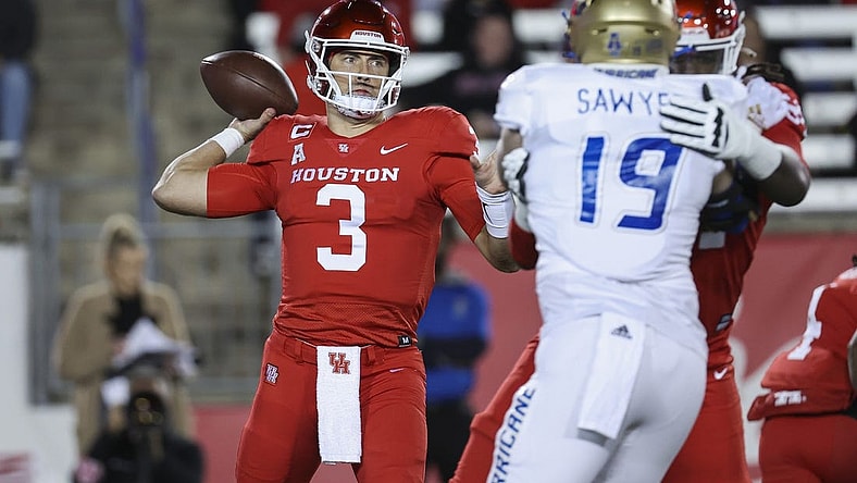 Nov 26, 2022; Houston, Texas, USA; Houston Cougars quarterback Clayton Tune (3) attempts a pass during the first quarter against the Tulsa Golden Hurricane at TDECU Stadium. Mandatory Credit: Troy Taormina-USA TODAY Sports