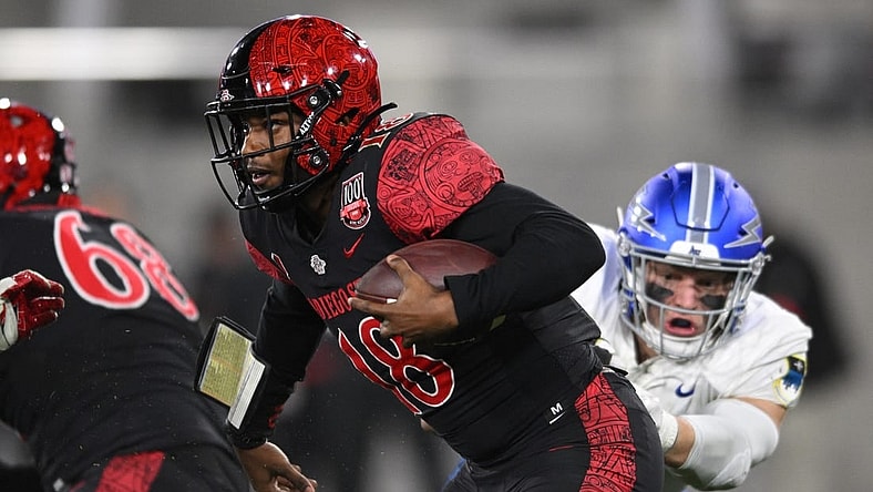 Nov 26, 2022; San Diego, California, USA; Air Force Falcons linebacker Bo Richter (8) sacks San Diego State Aztecs quarterback Jalen Mayden (18) during the second half at Snapdragon Stadium. Mandatory Credit: Orlando Ramirez-USA TODAY Sports