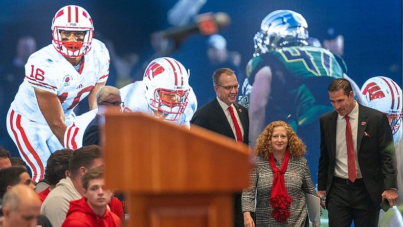 New Wisconsin head football coach Luke Fickell, right, joins  athletic director Chris McIntosh, left, and Chancellor Jennifer Mnookin at a welcome event Monday, November 28, 2022. at Camp Randall Stadium in Madison, Wis. He was previously head coach for six seasons at Cincinnati.MARK HOFFMAN/MILWAUKEE JOURNAL SENTINEL

Mjs Uwgrid28 4 Jpg Uwgrid Fickell