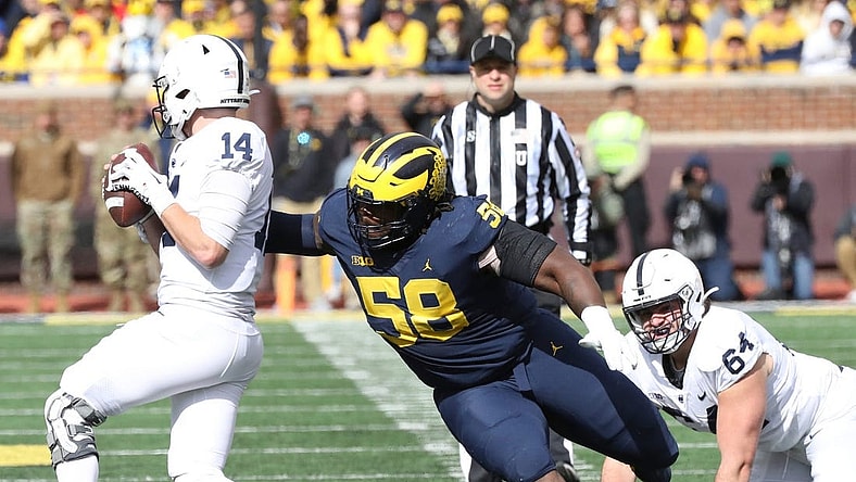 Michigan defensive lineman Mazi Smith (58) pressures Penn State quarterback Sean Clifford (14) during the second half Oct. 15, 2022 at Michigan Stadium in Ann Arbor.
Michpenn 101522 Kd 0016511