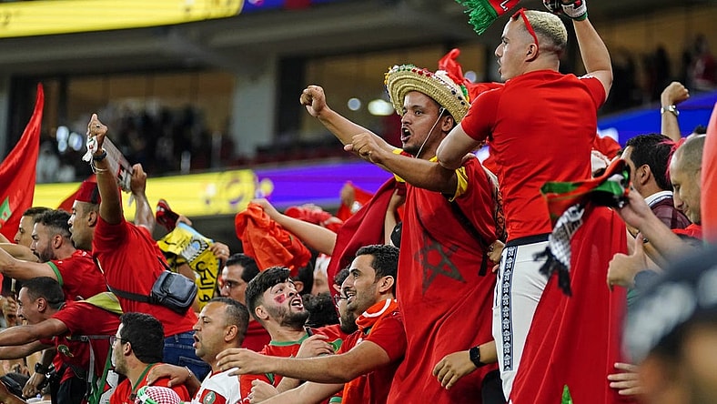 Dec 1, 2022; Doha, Qatar; Morocco fans celebrate after winning a group stage match against Canada to finish in first place in their group during the 2022 World Cup at Al Thumama Stadium. Mandatory Credit: Danielle Parhizkaran-USA TODAY Sports