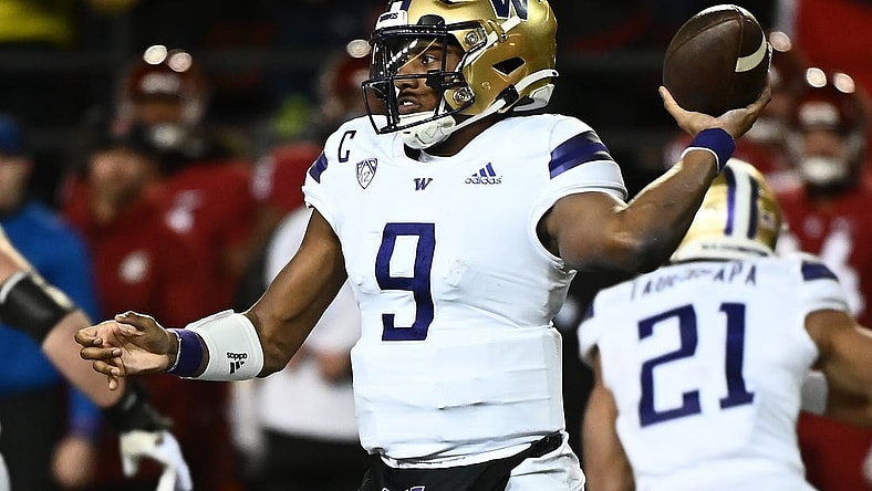 Nov 26, 2022; Pullman, Washington, USA; Washington Huskies quarterback Michael Penix Jr. (9) throws a pass against the Washington State Cougars in the second half at Gesa Field at Martin Stadium. Mandatory Credit: James Snook-USA TODAY Sports