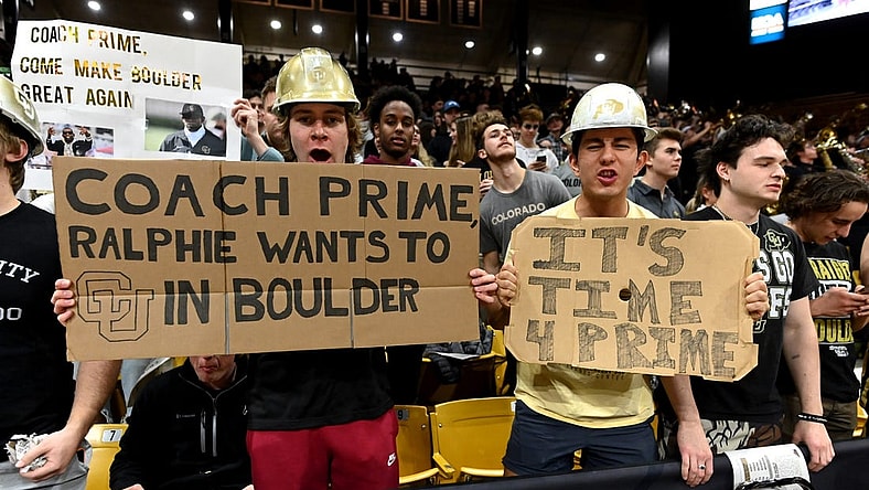 Dec 1, 2022; Boulder, Colorado, USA; Colorado Buffaloes student fans hold signs in reference to Jackson State University head coach Deion Sanders (not pictured) before the game against the Arizona State Sun Devils at the CU Events Center. Mandatory Credit: Ron Chenoy-USA TODAY Sports
