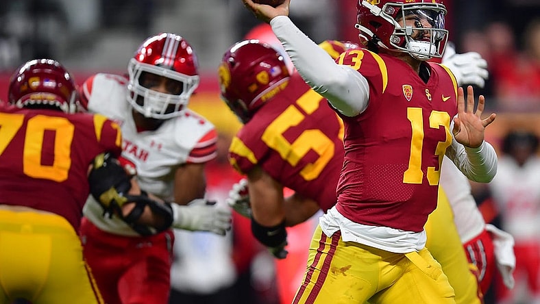 Dec 2, 2022; Las Vegas, NV, USA; Southern California Trojans quarterback Caleb Williams (13) throws against the Utah Utes during the second half in the PAC-12 Football Championship at Allegiant Stadium. Mandatory Credit: Gary A. Vasquez-USA TODAY Sports