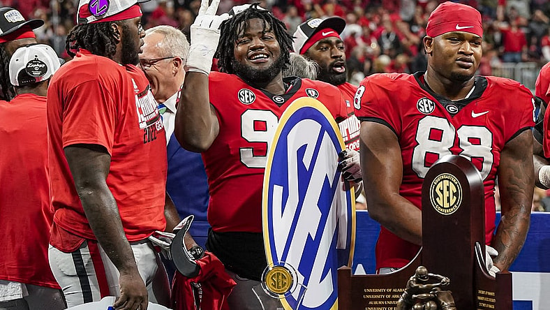 Dec 3, 2022; Atlanta, GA, USA; Georgia Bulldogs players react after defeating the LSU Tigers in the SEC Championship game at Mercedes-Benz Stadium. Mandatory Credit: Dale Zanine-USA TODAY Sports