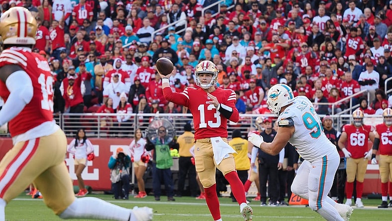 Dec 4, 2022; Santa Clara, California, USA; San Francisco 49ers quarterback Brock Purdy (13) throws the ball against Miami Dolphins defensive end Zach Sieler (92) during the first quarter at Levi's Stadium. Mandatory Credit: Kelley L Cox-USA TODAY Sports