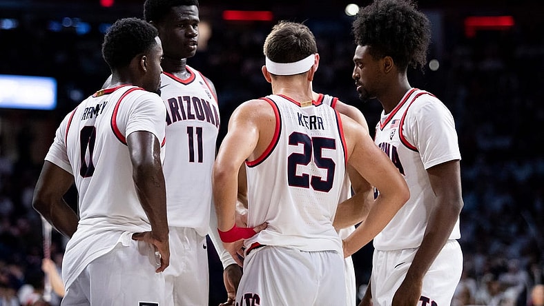 Dec 4, 2022; Tucson, Arizona, USA; Arizona Wildcats guard Kerr Kriisa (25), guard Courtney Ramey (0),  center Oumar Ballo (11) and guard Cedric Henderson Jr. (45) huddle during the second half against the Cal Golden Bears at McKale Center. Mandatory Credit: Zachary BonDurant-USA TODAY Sports