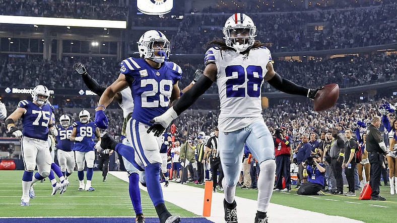 Dec 4, 2022; Arlington, Texas, USA;  Dallas Cowboys safety Malik Hooker (28) recovers a fumble and runs it back for a touchdown  during the fourth quarter against the Indianapolis Colts at AT&T Stadium. Mandatory Credit: Kevin Jairaj-USA TODAY Sports