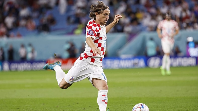 Dec 5, 2022; Al-Wakrah, Qatar; Croatia midfielder Luka Modric (10) controls the ball during the first half of a round of sixteen match against Japan during the 2022 FIFA World Cup at Al-Janoub Stadium. Mandatory Credit: Yukihito Taguchi-USA TODAY Sports