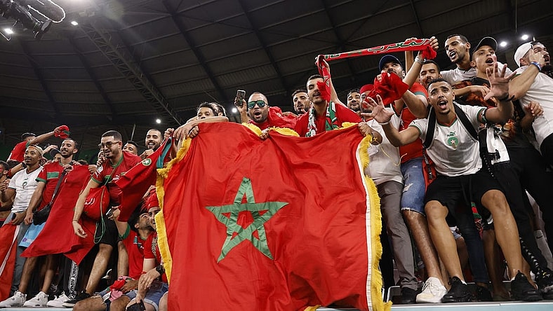 Dec 6, 2022; Ar Rayyan, QATAR; Morocco supporters celebrate the victory against Spain in penalty kicks in the round of sixteen match of the 2022 FIFA World Cup at Education City Stadium. Mandatory Credit: Yukihito Taguchi-USA TODAY Sports