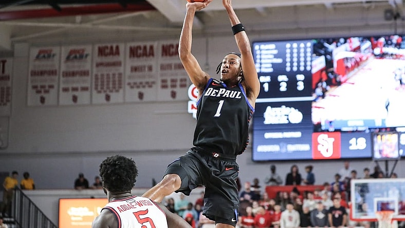 Dec 7, 2022; Queens, New York, USA; DePaul Blue Demons forward Javan Johnson (1) takes a three point shot in the first half against the St. John's Red Storm at Carnesecca Arena. Mandatory Credit: Wendell Cruz-USA TODAY Sports
