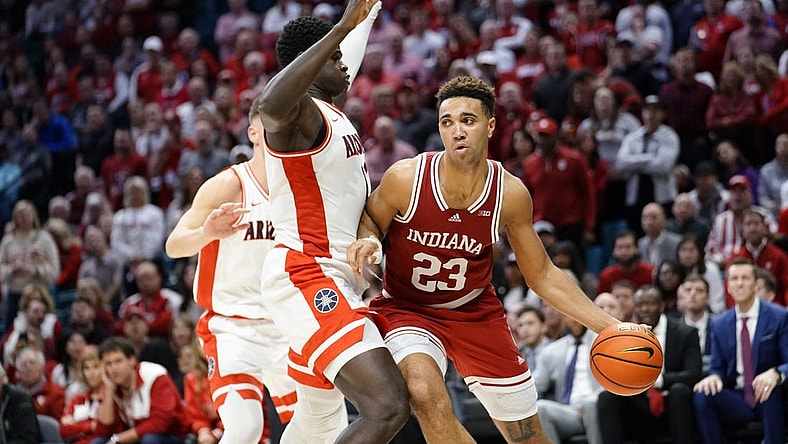 Dec 10, 2022; Las Vegas, Nevada, USA; Indiana Hoosiers forward Trayce Jackson-Davis (23) controls the ball against Arizona Wildcats center Oumar Ballo (11) during the second half at MGM Grand Garden Arena. Mandatory Credit: Lucas Peltier-USA TODAY Sports