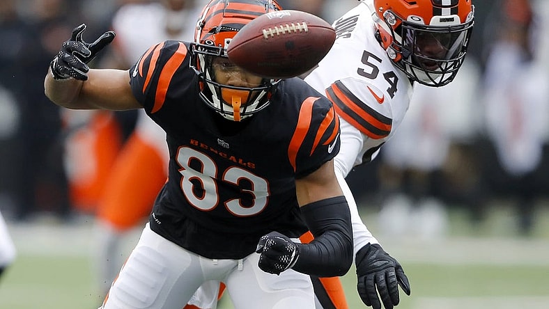 Dec 11, 2022; Cincinnati, Ohio, USA;  Cincinnati Bengals wide receiver Tyler Boyd (83) has the ball stripped by Cleveland Browns linebacker Deion Jones (54) during the first quarter at Paycor Stadium. Mandatory Credit: Joseph Maiorana-USA TODAY Sports