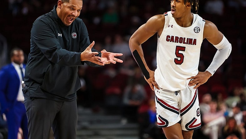 Dec 11, 2022; Columbia, South Carolina, USA; South Carolina Gamecocks head coach Lamont Paris directs South Carolina Gamecocks guard Meechie Johnson (5) against the Presbyterian Blue Hose in the second half at Colonial Life Arena. Mandatory Credit: Jeff Blake-USA TODAY Sports