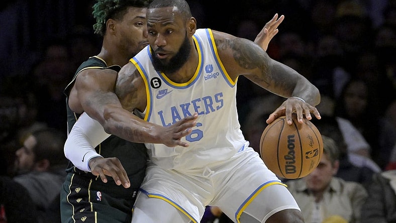 Dec 13, 2022; Los Angeles, California, USA;  Los Angeles Lakers forward LeBron James (6) is defended by Boston Celtics guard Marcus Smart (36) in the first half at Crypto.com Arena. Mandatory Credit: Jayne Kamin-Oncea-USA TODAY Sports