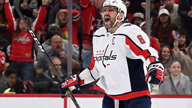 Dec 13, 2022; Chicago, Illinois, USA; Washington Capitals forward Alex Ovechkin (8) celebrates after scoring his 800th career NHL goal and third goal of the game against the Chicago Blackhawks at United Center. Mandatory Credit: Jamie Sabau-USA TODAY Sports