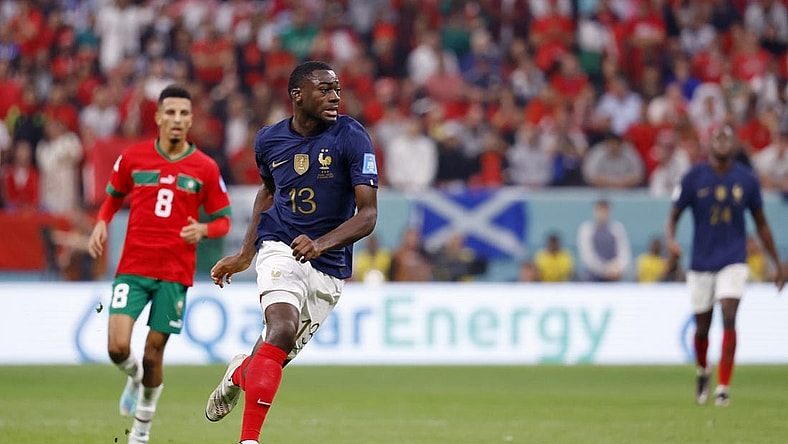 Dec 14, 2022; Al Khor, Qatar; France midfielder Youssouf Fofana (13) dribbles the ball against Morocco during the second half of a semifinal match during the 2022 World Cup at Al Bayt Stadium. Mandatory Credit: Yukihito Taguchi-USA TODAY Sports