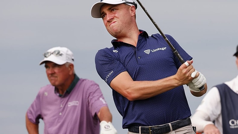 Dec 17, 2022; Orlando, Florida, USA;  Justin Thomas watches his drive on the tenth tee with father Mike Thomas looking on during the first round of the PNC Championship golf tournament at Ritz Carlton Golf Club Grande Lakes Orlando Course. Mandatory Credit: Reinhold Matay-USA TODAY Sports