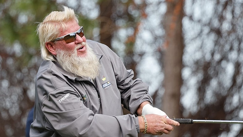 Dec 18, 2022; Orlando, Florida, USA; John Daly hits his tee shot on the fourth hole during the final round of the PNC Championship golf tournament at Ritz Carlton Golf Club Grande Lakes Orlando Course. Mandatory Credit: Reinhold Matay-USA TODAY Sports