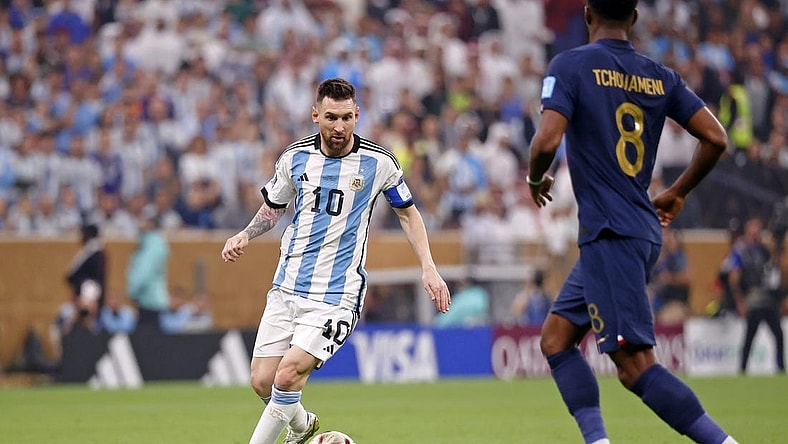 Dec 18, 2022; Lusail, Qatar; Argentina forward Lionel Messi (10) dribbles the ball against France during the first half of the 2022 World Cup final at Lusail Stadium. Mandatory Credit: Yukihito Taguchi-USA TODAY Sports