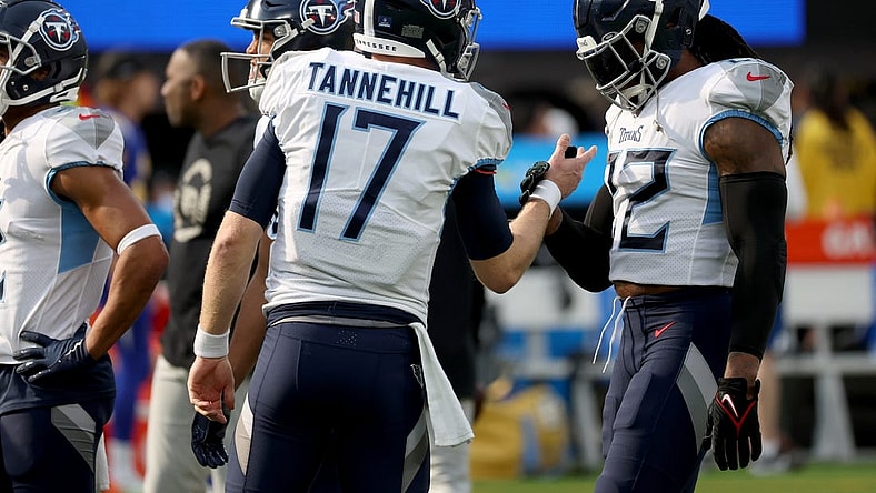Dec 18, 2022; Inglewood, California, USA;  Tennessee Titans quarterback Ryan Tannehill (17) and running back Derrick Henry (22) shake hands before the game against the Los Angeles Chargersat SoFi Stadium. Mandatory Credit: Kiyoshi Mio-USA TODAY Sports