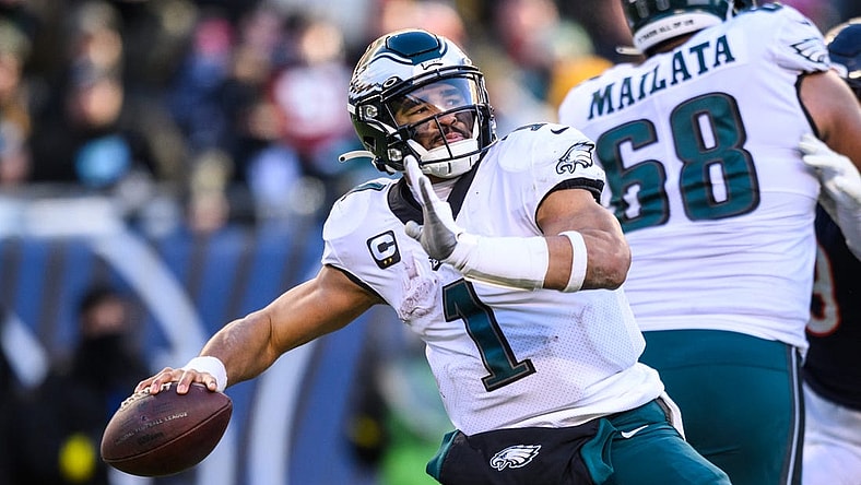 Dec 18, 2022; Chicago, Illinois, USA; Philadelphia Eagles quarterback Jalen Hurts (1) passes the ball in the fourth quarter against the Chicago Bears at Soldier Field. Mandatory Credit: Daniel Bartel-USA TODAY Sports
