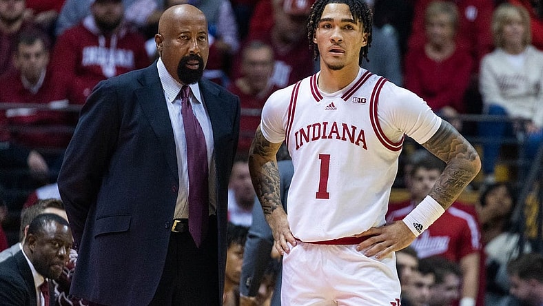 Dec 20, 2022; Bloomington, Indiana, USA; Indiana Hoosiers head coach Mike Woodson and guard Jalen Hood-Schifino (1) in the first half against the Elon Phoenix at Simon Skjodt Assembly Hall. Mandatory Credit: Trevor Ruszkowski-USA TODAY Sports