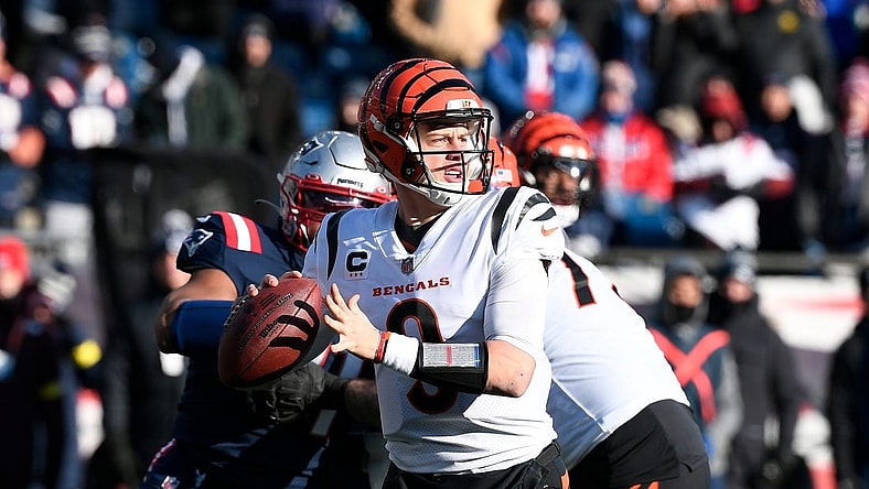 Dec 24, 2022; Foxborough, Massachusetts, USA; Cincinnati Bengals quarterback Joe Burrow (9) throws a pass against the New England Patriots during the first half at Gillette Stadium. Mandatory Credit: Eric Canha-USA TODAY Sports