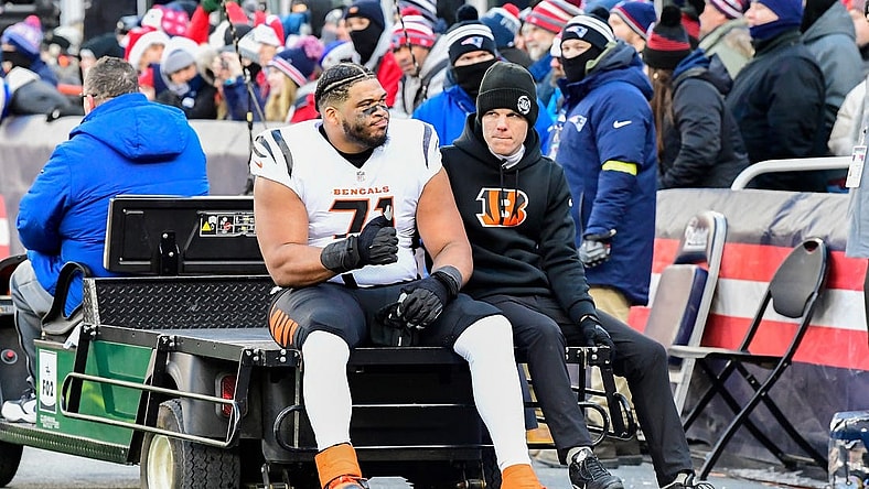 Dec 24, 2022; Foxborough, Massachusetts, USA; Cincinnati Bengals offensive tackle La'el Collins (71) leaves the field on a cart during the first half against the New England Patriots at Gillette Stadium. Mandatory Credit: Eric Canha-USA TODAY Sports