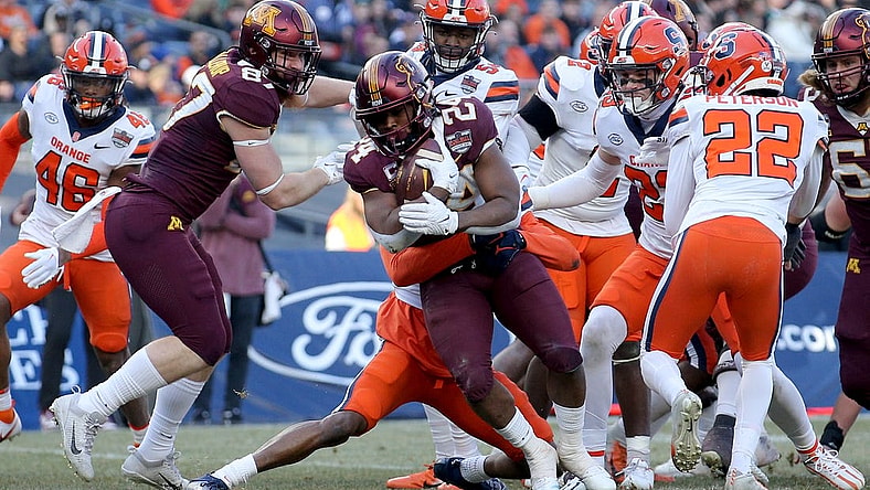 Dec 29, 2022; Bronx, NY, USA; Minnesota Golden Gophers running back Mohamed Ibrahim (24) runs for a touchdown against the Syracuse Orange during the second quarter of the 2022 Pinstripe Bowl at Yankee Stadium. Mandatory Credit: Brad Penner-USA TODAY Sports