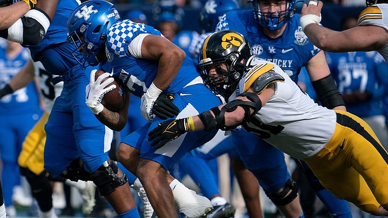 Kentucky running back JuTahn McClain (17) is stopped by Iowa linebacker Jack Campbell (31) during the first quarter of the TransPerfect Music City Bowl at Nissan Stadium Saturday, Dec. 31, 2022, in Nashville, Tenn.

Ncaa Football Music City Bowl Iowa At Kentucky

Syndication The Tennessean
