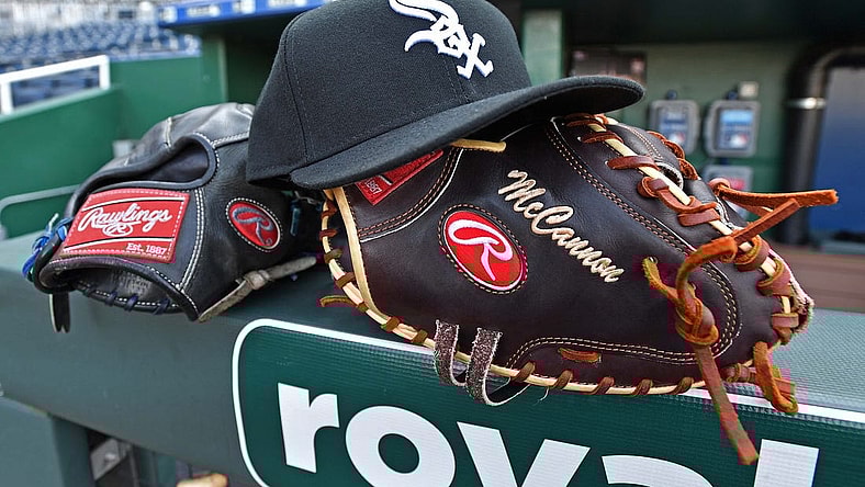 Jul 17, 2019; Kansas City, MO, USA; A general view of Chicago White Sox gloves and cap, prior to a game against the Kansas City Royals at Kauffman Stadium. Mandatory Credit: Peter G. Aiken/USA TODAY Sports