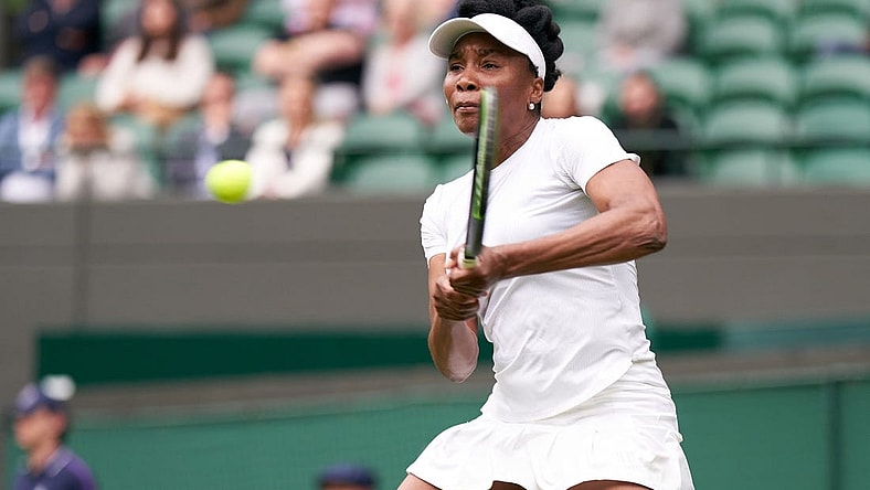 Jun 30, 2021; London, United Kingdom; Venus Williams (USA) seen playing Ons Jabeur (TUN) in second round  singles on No. 1 court at All England Lawn Tennis and Croquet Club. Mandatory Credit: Peter van den Berg-USA TODAY Sports