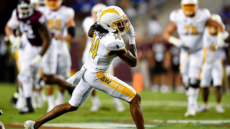 Sep 4, 2021; College Station, Texas, USA; Kent State Golden Flashes wide receiver Dante Cephas (14) receives the pass from Kent State Golden Flashes quarterback Dustin Crum (not shown) during the second quarter against the Texas A&M Aggies at Kyle Field. Mandatory Credit: Maria Lysaker-USA TODAY Sports