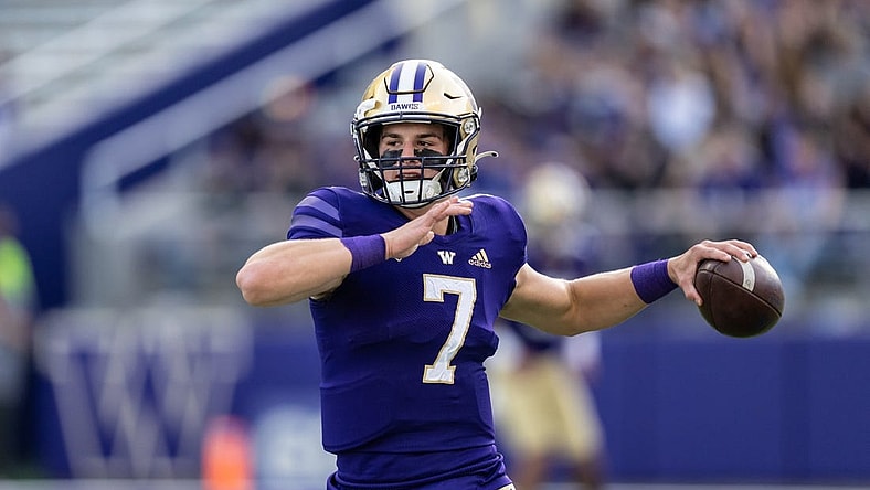 Sep 25, 2021; Seattle, Washington, USA; Washington Huskies quarterback Sam Huard (7) passes the ball before a game against the California Golden Bears at Alaska Airlines Field at Husky Stadium. The Huskies won 31-24 in overtime. Mandatory Credit: Stephen Brashear-USA TODAY Sports