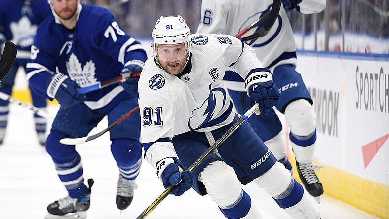 Dec 9, 2021; Toronto, Ontario, CAN; Tampa Bay Lightning forward Steve Stamkos (91) pursues the play against Toronto Maple Leafs in the second period at Scotiabank Arena. Mandatory Credit: Dan Hamilton-USA TODAY Sports