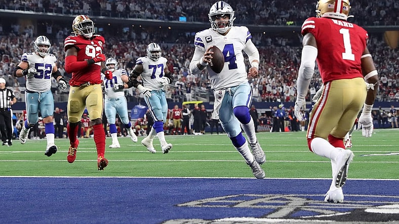 Jan 16, 2022; Arlington, Texas, USA; Dallas Cowboys quarterback Dak Prescott (4) runs for a touchdown against the San Francisco 49ers during the second half of the NFC Wild Card playoff football game at AT&T Stadium. Mandatory Credit: Kevin Jairaj-USA TODAY Sports