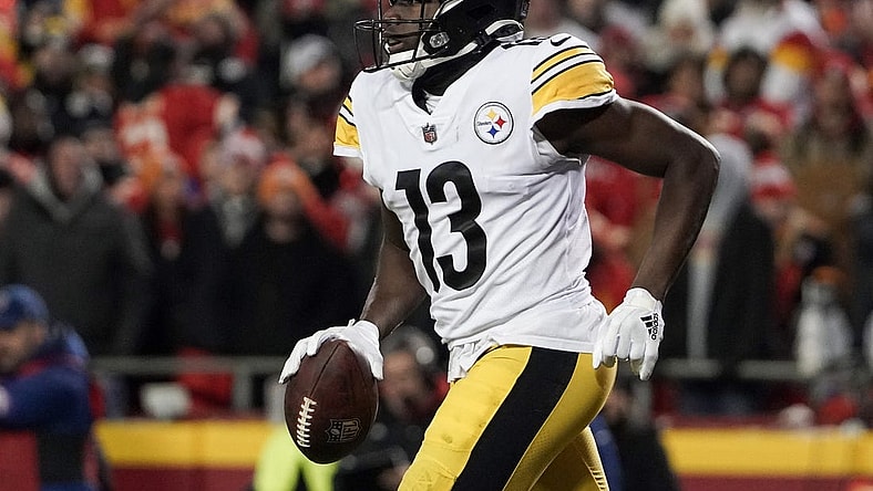 Jan 16, 2022; Kansas City, Missouri, USA; Pittsburgh Steelers wide receiver James Washington (13) returns to the sidelines after scoring against the Kansas City Chiefs in an AFC Wild Card playoff football game at GEHA Field at Arrowhead Stadium. Mandatory Credit: Denny Medley-USA TODAY Sports