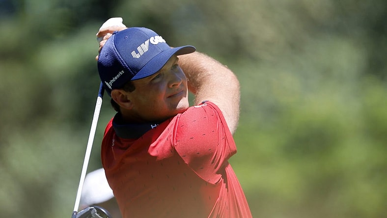 Jun 30, 2022; Portland, Oregon, USA; Patrick Reed watches his drive on the second hole during the first round of the LIV Golf tournament at Pumpkin Ridge Golf Club. Mandatory Credit: Soobum Im-USA TODAY Sports