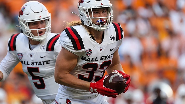 Sep 1, 2022; Knoxville, Tennessee, USA; Ball State Cardinals running back Carson Steele (33) runs with the ball against the Tennessee Volunteers during the first half at Neyland Stadium. Mandatory Credit: Randy Sartin-USA TODAY Sports