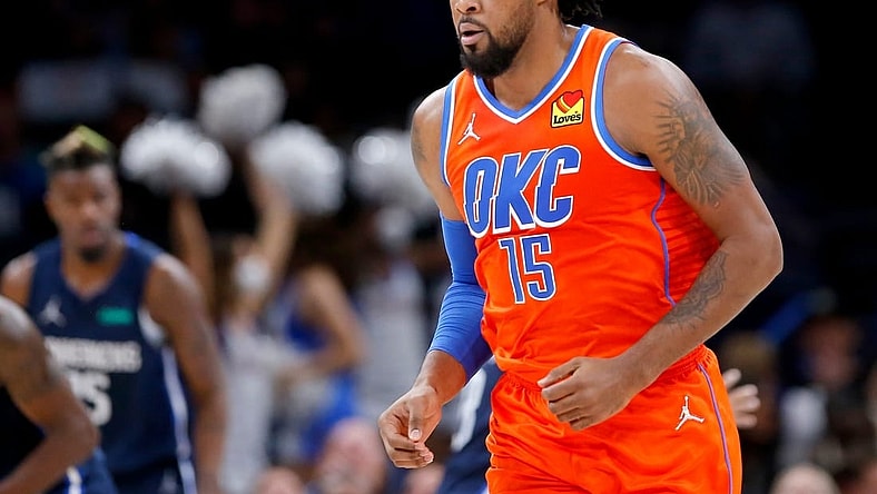 Thunder forward Derrick Favors (15) reacts after a 3-point basket against the Mavericks on Dec. 12 at Paycom Center.

Thunder Mavericks