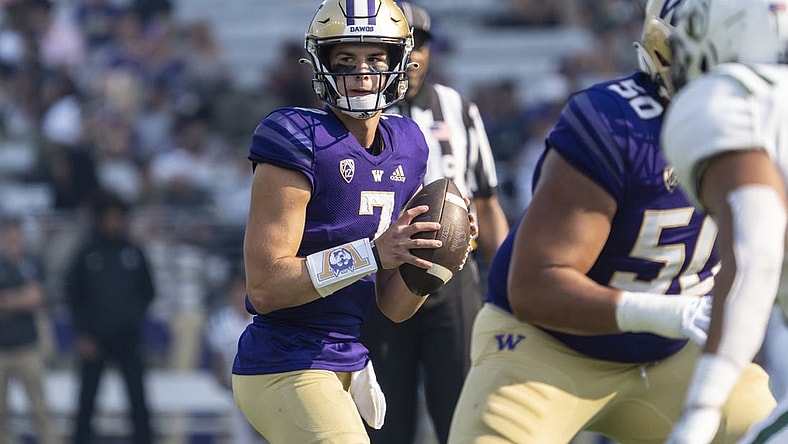 Sep 10, 2022; Seattle, Washington, USA; Washington Huskies quarterback Sam Huard (7) looks to pass during the second half against the Portland State Vikings at Alaska Airlines Field at Husky Stadium. Mandatory Credit: Stephen Brashear-USA TODAY Sports