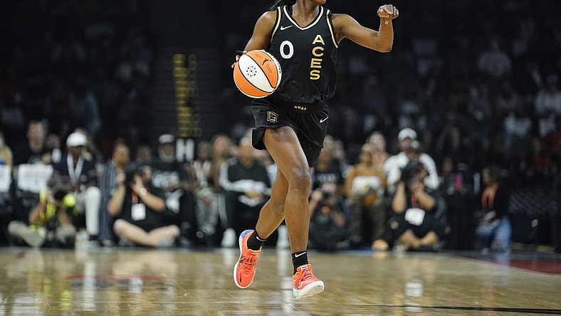 Sep 13, 2022; Las Vegas, Nevada, USA; Las Vegas Aces guard Jackie Young (0) dribbles the ball during the first quarter against the Connecticut Sun in game two of the WNBA Finals at Michelob Ultra Arena. Mandatory Credit: Lucas Peltier-USA TODAY Sports