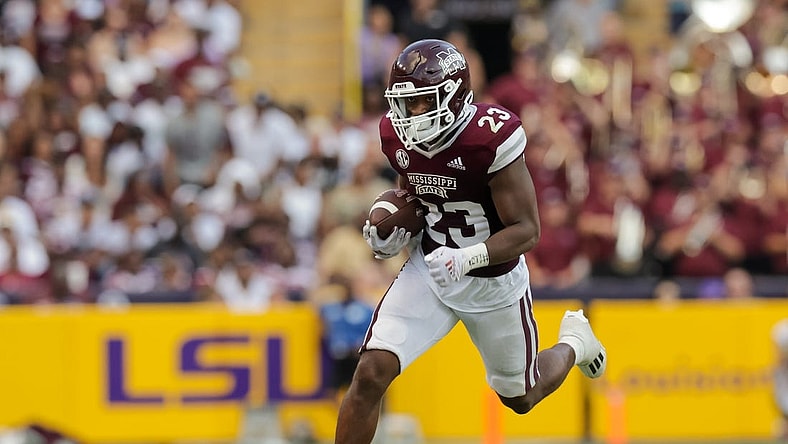 Sep 17, 2022; Baton Rouge, Louisiana, USA; Mississippi State Bulldogs running back Dillon Johnson (23) rushes against the LSU Tigers during the first half at Tiger Stadium. Mandatory Credit: Stephen Lew-USA TODAY Sports
