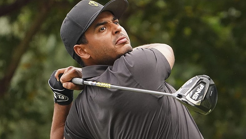 Sep 25, 2022; Charlotte, North Carolina, USA; International Team golfer Sebastian Munoz hits his tee shot on the 17th hole during the singles match play of the Presidents Cup golf tournament at Quail Hollow Club. Mandatory Credit: Peter Casey-USA TODAY Sports